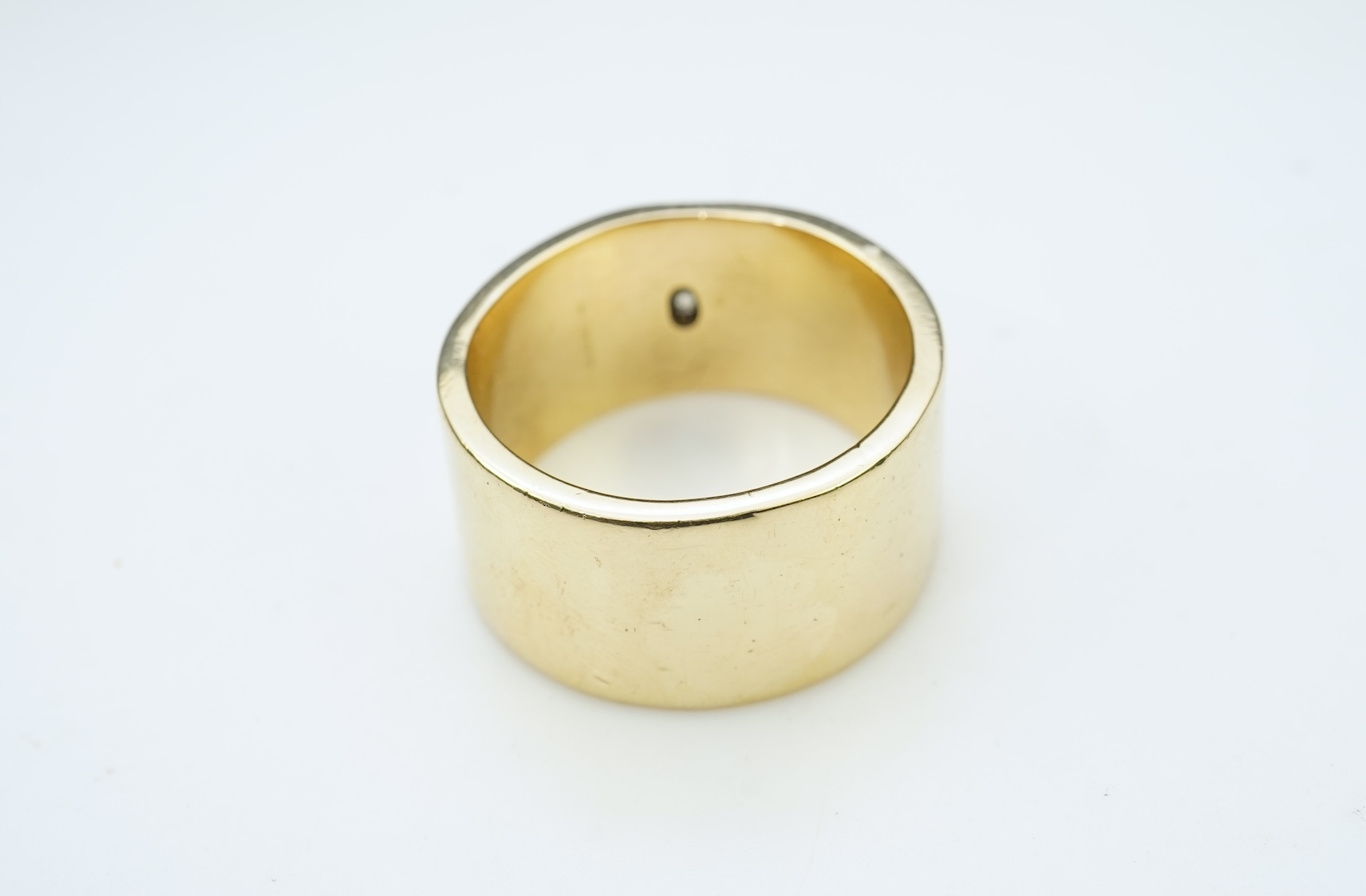 A gold and diamond ring